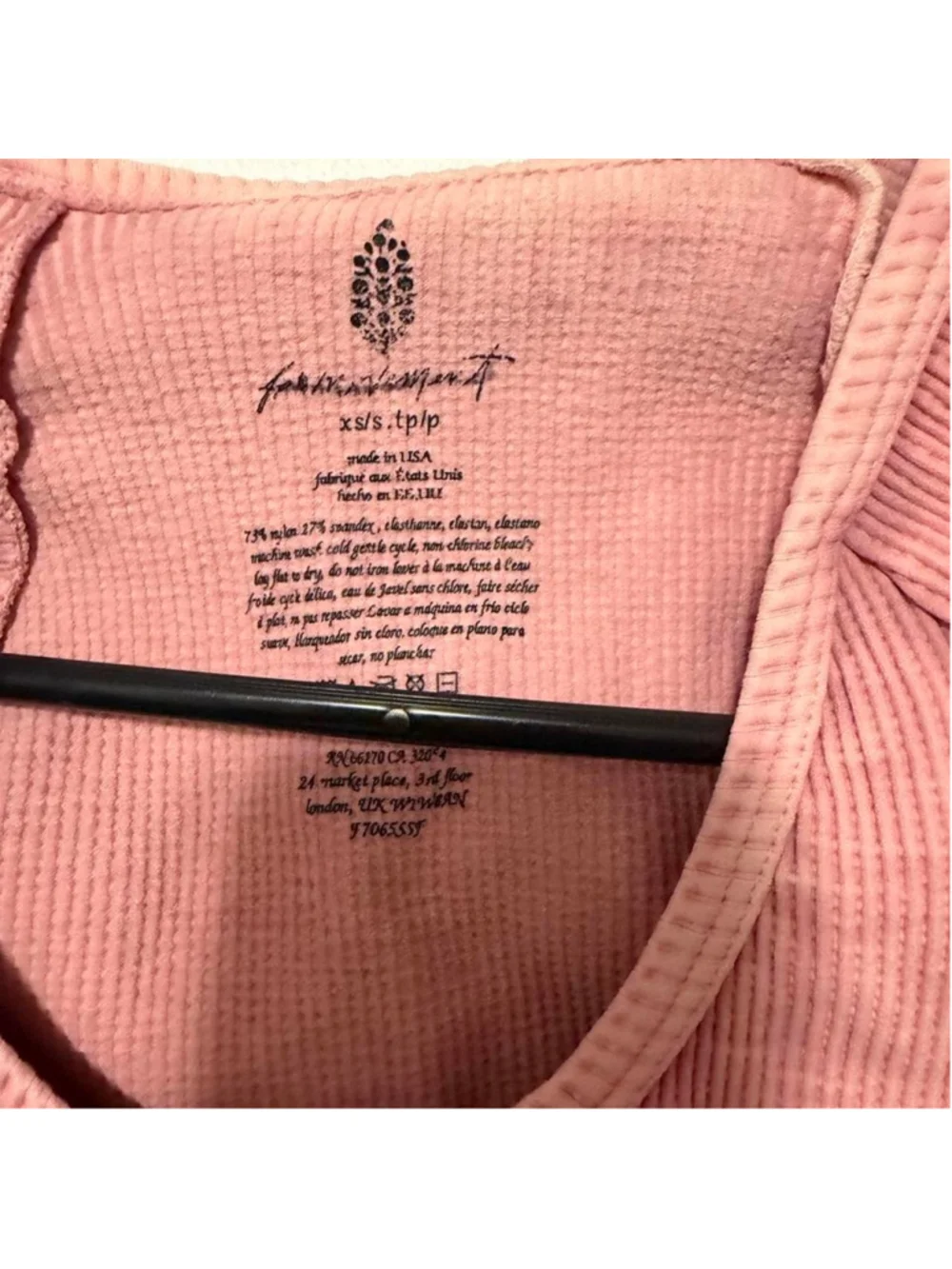 Free People Movement ribbed cropped long sleeve top in a pretty dusty pink/rose